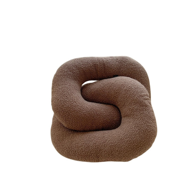 knot twist chain squiggle worm plush throw pillows decorative cushions neutral tones fun shaped earthy minimal nordic home decor living room sofa styling