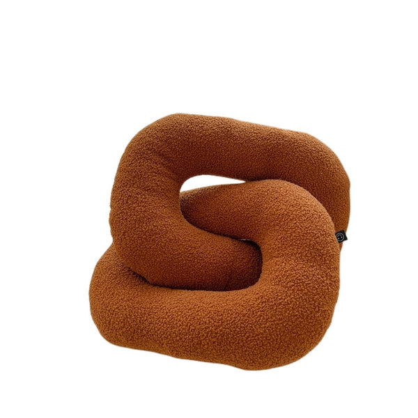 knot twist chain squiggle worm plush throw pillows decorative cushions neutral tones fun shaped earthy minimal nordic home decor living room sofa styling