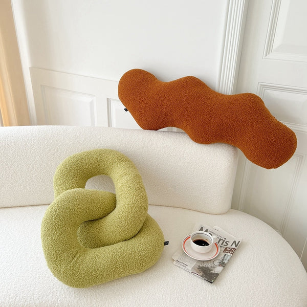 knot twist chain squiggle worm plush throw pillows decorative cushions neutral tones fun shaped earthy minimal nordic home decor living room sofa styling