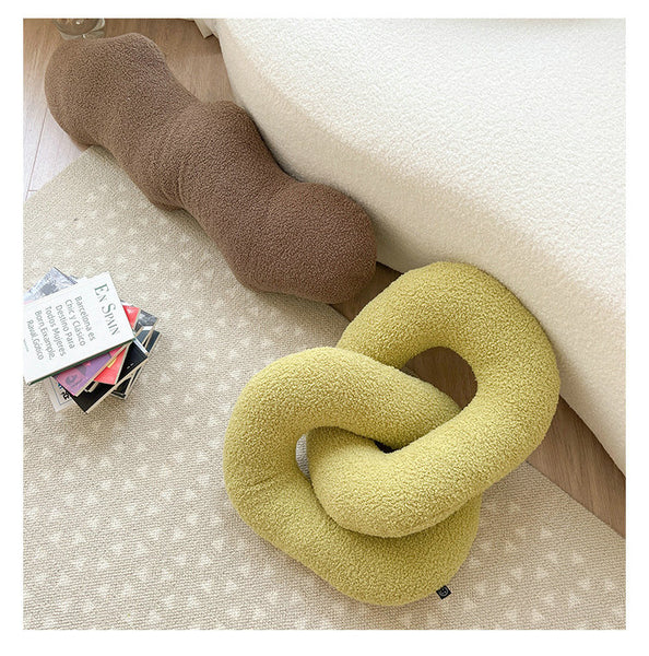 knot twist chain squiggle worm plush throw pillows decorative cushions neutral tones fun shaped earthy minimal nordic home decor living room sofa styling