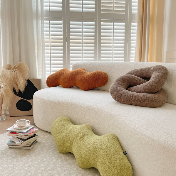 knot twist chain squiggle worm plush throw pillows decorative cushions neutral tones fun shaped earthy minimal nordic home decor living room sofa styling