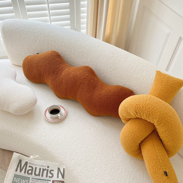 knot twist chain squiggle worm plush throw pillows decorative cushions neutral tones fun shaped earthy minimal nordic home decor living room sofa styling