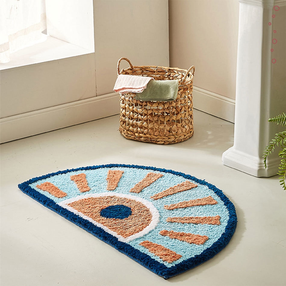 Peppery Home Geometric Bath Mat in navy blue and orange semi circle bathroom  rug