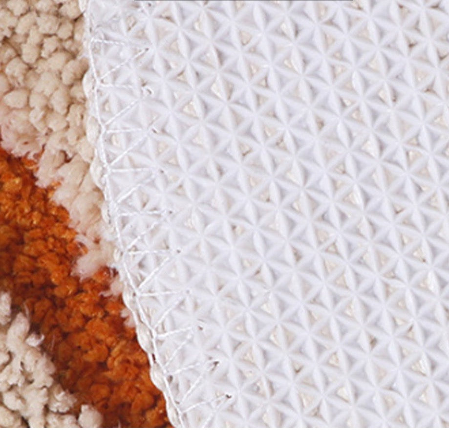 Peppery Home Sea Shell Shaped Bath Mat - beige and white clam bathroom rugs