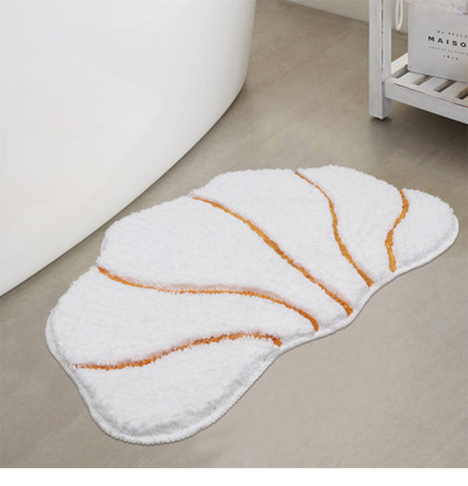 Peppery Home Sea Shell Shaped Bath Mat - beige and white clam bathroom rugs